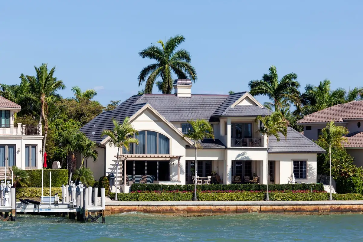 76208637 l 123rf waterfront home exterior port royal aqualane shores (1) (1) Aqualane Shores home, Naples, FL