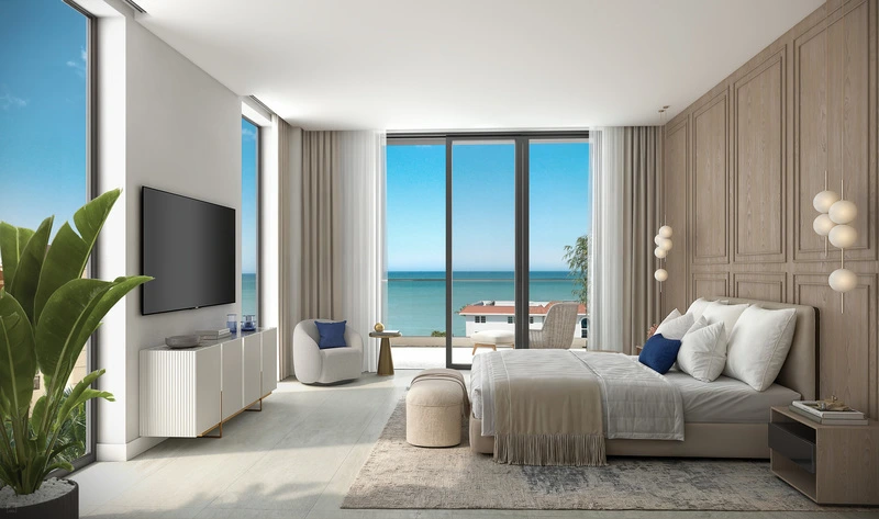 3300 Gulf Shore Blvd primary bedroom with 11-foot ceilings and floor-to-ceiling glass sliders, Naples FL luxury condominium
