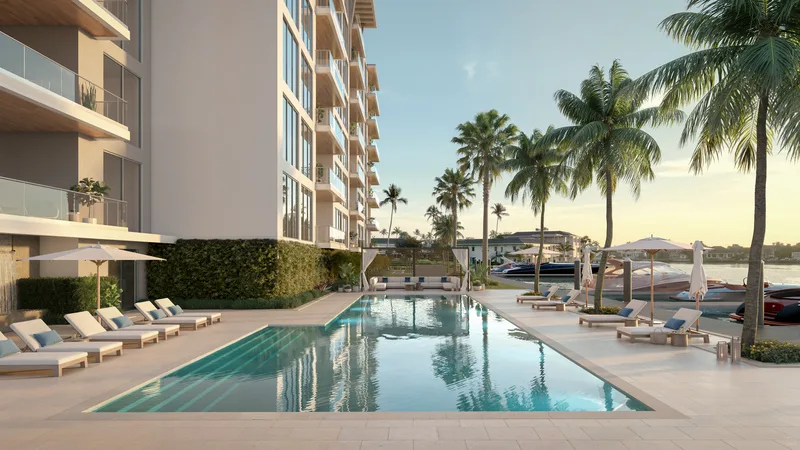3300 Gulf Shore Blvd 75-foot sunrise lap pool with bayfront views, Naples FL luxury waterfront condominium