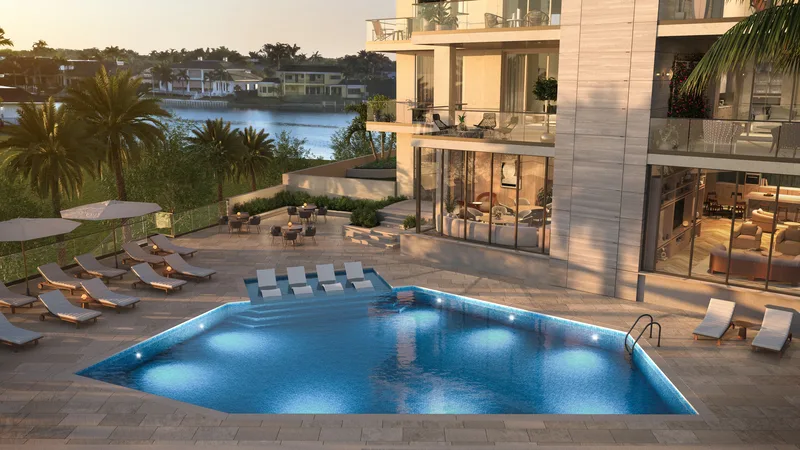 3300 Gulf Shore Blvd sunset resort-style pool with cabanas and sun deck, Naples FL luxury waterfront condominium