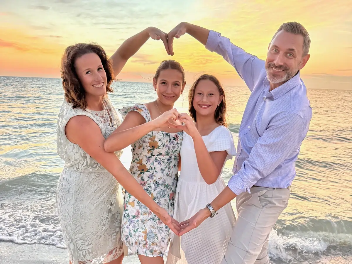 Matt Brown and family on the Naples beach at sunset