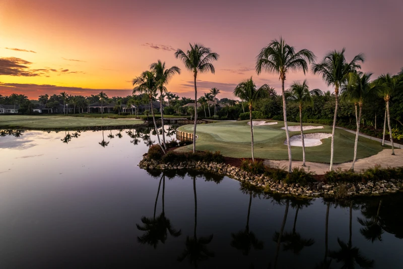 Southwest Florida golf course with palm trees and blue sky