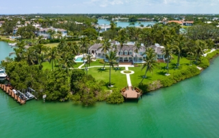 port royal naples aerial view waterfront estate on private peninsula with private dock, boat lift, pool, and gulf access in naples florida