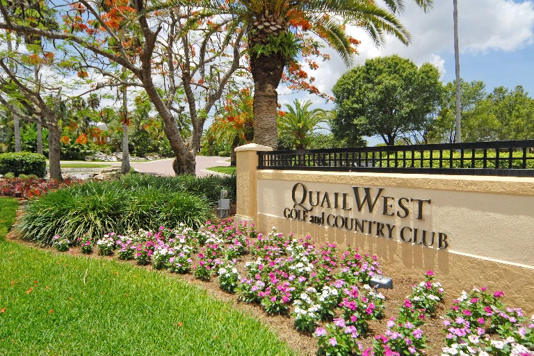 Quail West Golf and Country Club entrance sign in Naples, Florida